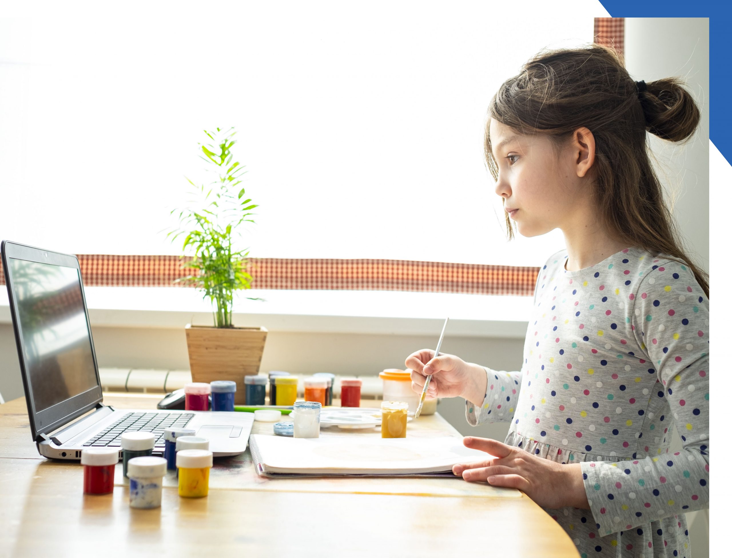 child attending a virtual painting class