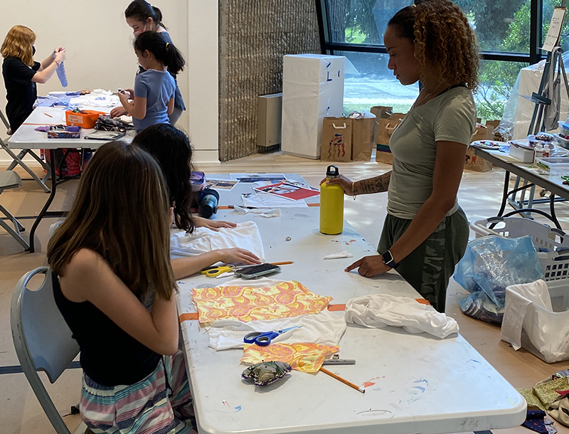 Tween artists working on a project during Summer Art Camp.