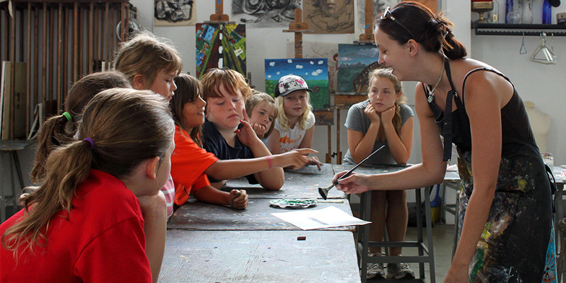 Art Teacher and children